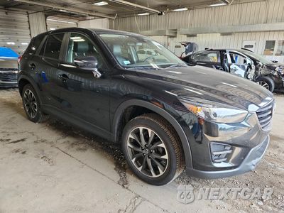Czwarte zdjęcie samochodu z boku: 2016 MAZDA CX-5 GT VIN:JM3KE4DY9G0640436 - miniatura