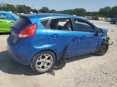 Trzecie zdjęcie samochodu z tyłu: 2011 FORD FIESTA SES VIN:3FADP4FJ9BM108921 - miniatura