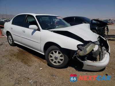 Czwarte zdjęcie samochodu z boku: 1999 CHEVROLET MALIBU LS VIN:1G1NE52M0X6107103 - miniatura