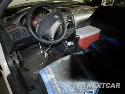 Zdjęcie 8 z 12 samochodu: 1999 TOYOTA CAMRY SOLARA SE VIN:2T1CF28P3XC100747 - miniatura