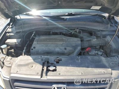 Zdjęcie 12 z 13 samochodu: 2004 HONDA PILOT VIN:2HKYF18574H530605 - miniatura