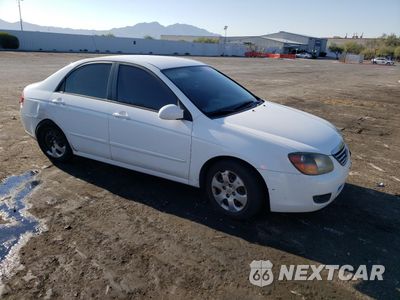 Czwarte zdjęcie samochodu z boku: 2009 KIA SPECTRA EX VIN:KNAFE221X95624012 - miniatura