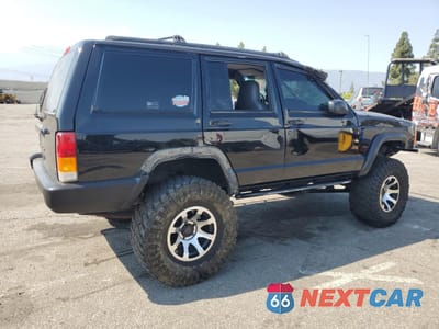 Trzecie zdjęcie samochodu z tyłu: 1997 JEEP CHEROKEE SE VIN:1J4FJ28S0VL509918 - miniatura