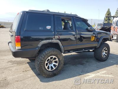 Trzecie zdjęcie samochodu z tyłu: 1997 JEEP CHEROKEE SE VIN:1J4FJ28S0VL509918 - miniatura