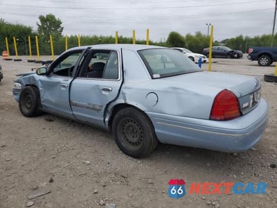Drugie zdjęcie samochodu z przodu: 1999 FORD CROWN VICTORIA LX VIN:2FAFP74W5XX121198 - miniatura