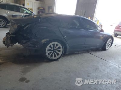 Trzecie zdjęcie samochodu z tyłu: 2021 TESLA MODEL 3 VIN:5YJ3E1EB7MF960793 - miniatura