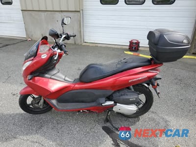 Trzecie zdjęcie samochodu z tyłu: 2013 HONDA PCX 150 VIN:MLHKF1213D5004746 - miniatura