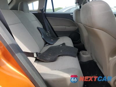 Zdjęcie 10 z 12 samochodu: 2011 DODGE CALIBER MAINSTREET VIN:1B3CB3HA9BD254258 - miniatura