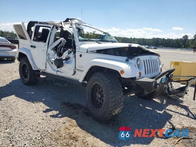 Czwarte zdjęcie samochodu z boku: 2012 JEEP WRANGLER UNLIMITED SAHARA VIN:1C4BJWEG0CL143502 - miniatura