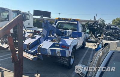 Czwarte zdjęcie samochodu z boku: 2012 FORD F550 SUPER DUTY VIN:1FDUF5GT8CEA89459 - miniatura