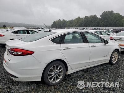 Trzecie zdjęcie samochodu z tyłu: 2017 FORD FUSION SE HYBRID VIN:3FA6P0LU0HR410092 - miniatura