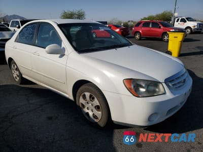 Czwarte zdjęcie samochodu z boku: 2006 KIA SPECTRA LX VIN:KNAFE121165239573 - miniatura