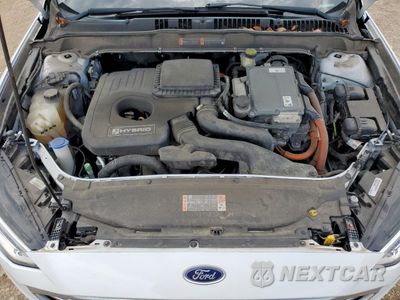 Zdjęcie 11 z 12 samochodu: 2017 FORD FUSION SE HYBRID VIN:3FA6P0LU0HR409038 - miniatura