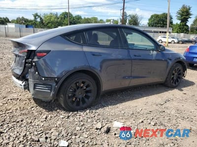 Trzecie zdjęcie samochodu z tyłu: 2023 TESLA MODEL Y VIN:7SAYGDEE1PA192096 - miniatura