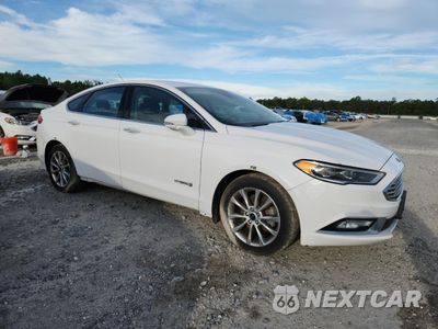 Czwarte zdjęcie samochodu z boku: 2017 FORD FUSION SE HYBRID VIN:3FA6P0LU9HR409572 - miniatura