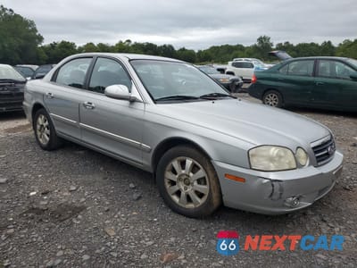 Czwarte zdjęcie samochodu z boku: 2006 KIA OPTIMA LX VIN:KNAGD128065443852 - miniatura