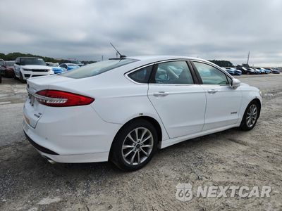 Trzecie zdjęcie samochodu z tyłu: 2017 FORD FUSION SE HYBRID VIN:3FA6P0LU4HR409236 - miniatura