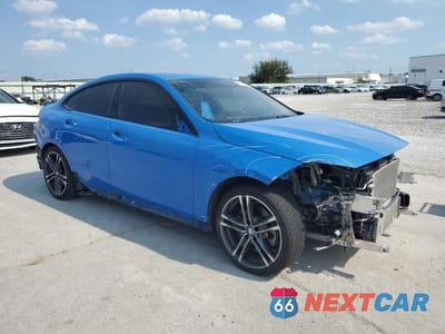 Czwarte zdjęcie samochodu z boku: 2021 BMW 228I VIN:WBA53AK06M7J74729 - miniatura