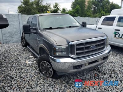 Czwarte zdjęcie samochodu z boku: 2004 FORD F250 SUPER DUTY SUPER DUTY VIN:1FTNW20P14EA28086 - miniatura