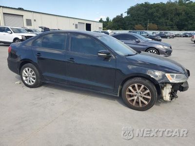 Czwarte zdjęcie samochodu z boku: 2012 VOLKSWAGEN JETTA SE VIN:3VWDX7AJ2CM343694 - miniatura
