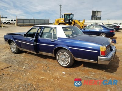 Drugie zdjęcie samochodu z przodu: 1985 OLDSMOBILE DELTA 88 ROYALE BROUGHAM VIN:1G3BY69Y2FY379333 - miniatura