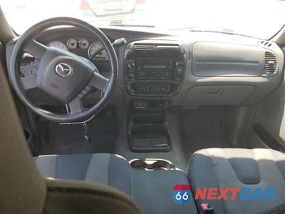 Zdjęcie 8 z 14 samochodu: 2004 MAZDA B4000 CAB PLUS VIN:4F4ZR47E94TM08675 - miniatura