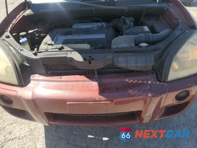 Zdjęcie 12 z 13 samochodu: 2006 HYUNDAI TUCSON GL VIN:KM8JM12B36U298876 - miniatura