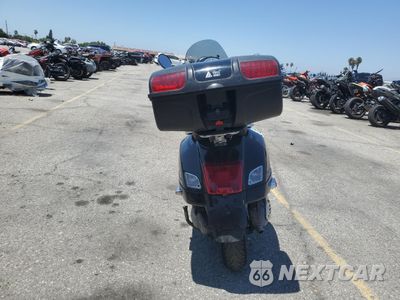 Czwarte zdjęcie samochodu z boku: 2010 VESPA GTS 300 SUPER VIN:ZAPM459L6A5700575 - miniatura