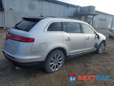 Trzecie zdjęcie samochodu z tyłu: 2013 LINCOLN MKT VIN:2LMHJ5ATXDBL53372 - miniatura