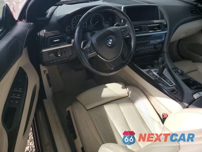 Zdjęcie 8 z 12 samochodu: 2012 BMW 650 I VIN:WBALZ3C52CDL72588 - miniatura