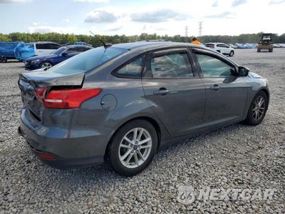 Trzecie zdjęcie samochodu z tyłu: 2015 FORD FOCUS SE VIN:1FADP3F2XFL290073 - miniatura