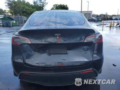 Zdjęcie 6 z 14 samochodu: 2024 TESLA MODEL Y VIN:7SAYGDED3RF053200 - miniatura