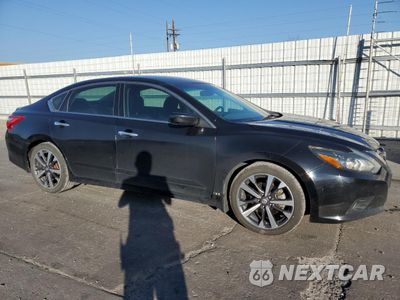 Czwarte zdjęcie samochodu z boku: 2016 NISSAN ALTIMA 2.5 VIN:1N4AL3AP4GN385333 - miniatura