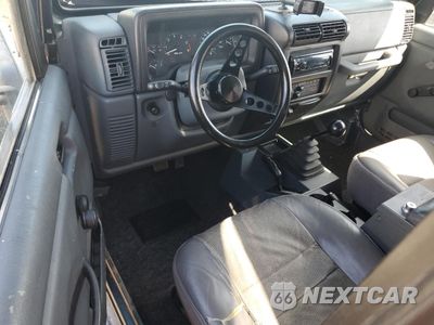 Zdjęcie 8 z 12 samochodu: 1998 JEEP WRANGLER / TJ SPORT VIN:1J4FY19S3WP797609 - miniatura