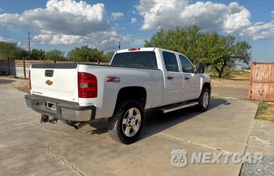 Czwarte zdjęcie samochodu z boku: 2014 CHEVROLET SILVERADO K2500 HEAVY DUTY LT VIN:1GC1KXCG3EF152326 - miniatura