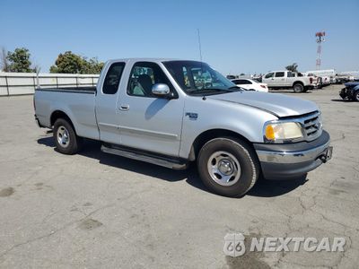 Czwarte zdjęcie samochodu z boku: 2000 FORD F150 VIN:1FTRX17W4YKA93446 - miniatura