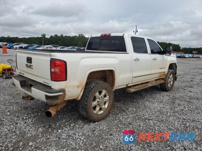 Czwarte zdjęcie samochodu z boku: 2016 GMC SIERRA K2500 DENALI VIN:1GT12UE8XGF123820 - miniatura