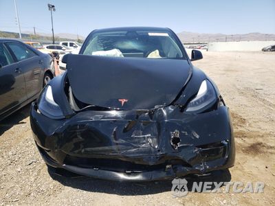 Piąte zdjęcie samochodu w środku: 2021 TESLA MODEL Y VIN:5YJYGDEF8MF261113 - miniatura