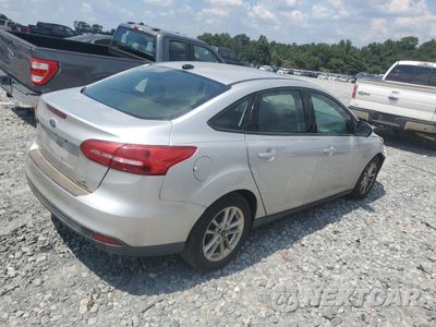 Trzecie zdjęcie samochodu z tyłu: 2016 FORD FOCUS SE VIN:1FADP3F23GL204300 - miniatura