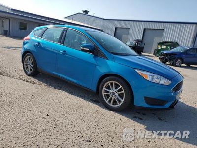 Czwarte zdjęcie samochodu z boku: 2015 FORD FOCUS SE VIN:1FADP3K27FL310978 - miniatura