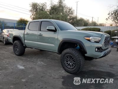 Czwarte zdjęcie samochodu z boku: 2023 TOYOTA TACOMA DOUBLE CAB VIN:3TYCZ5ANXPT107370 - miniatura