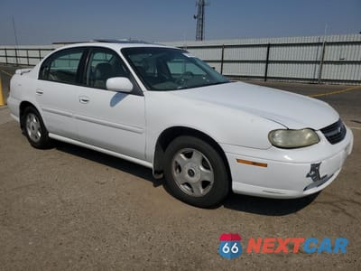 Czwarte zdjęcie samochodu z boku: 2001 CHEVROLET MALIBU LS VIN:1G1NE52J516255454 - miniatura