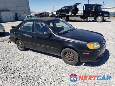 Czwarte zdjęcie samochodu z boku: 2003 HYUNDAI ACCENT GL VIN:KMHCG45C43U465134 - miniatura