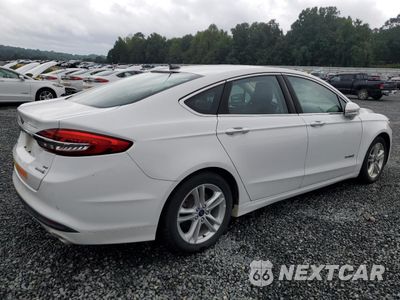 Trzecie zdjęcie samochodu z tyłu: 2018 FORD FUSION SE HYBRID VIN:3FA6P0LU1JR171917 - miniatura