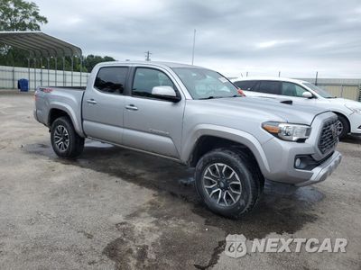Czwarte zdjęcie samochodu z boku: 2020 TOYOTA TACOMA DOUBLE CAB VIN:3TMCZ5ANXLM334340 - miniatura