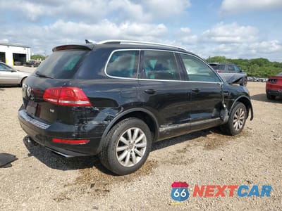 Trzecie zdjęcie samochodu z tyłu: 2011 VOLKSWAGEN TOUAREG V6 VIN:WVGFF9BP1BD001088 - miniatura