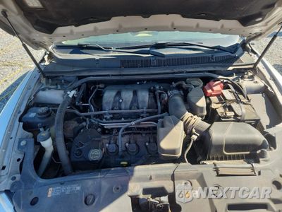 Zdjęcie 11 z 15 samochodu: 2014 FORD TAURUS SEL VIN:1FAHP2E83EG150035 - miniatura