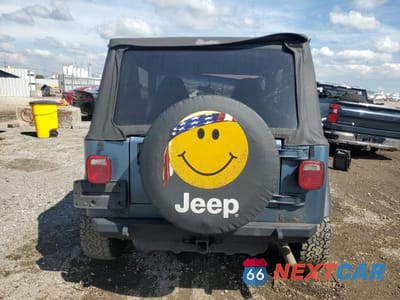 Zdjęcie 6 z 12 samochodu: 1998 JEEP WRANGLER / TJ SPORT VIN:1J4FY19S3WP797609 - miniatura