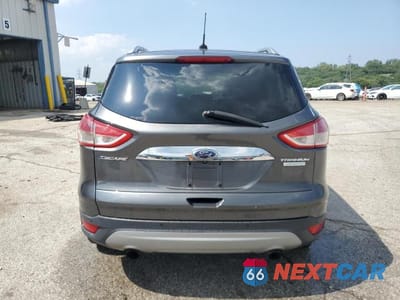 Zdjęcie 6 z 14 samochodu: 2016 FORD ESCAPE TITANIUM VIN:1FMCU0JX9GUC09216 - miniatura