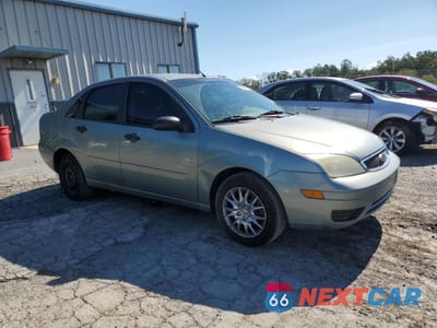 Czwarte zdjęcie samochodu z boku: 2005 FORD FOCUS ZX4 VIN:1FAHP34N05W110059 - miniatura